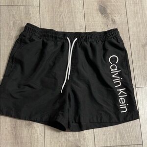 Calvin Klein Black Swim Trunks with White Logo